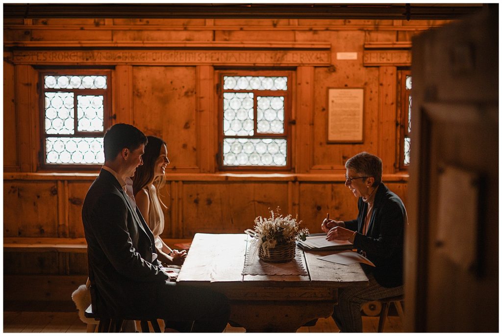 Couple sharing joyful moment during Klosters Switzerland destination wedding