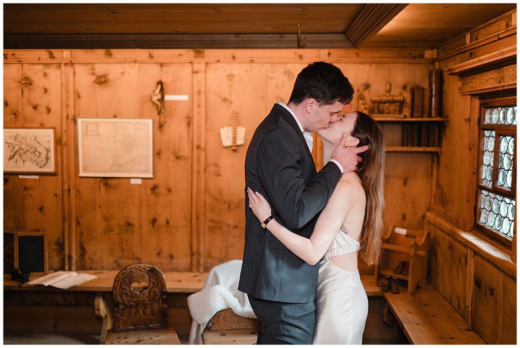 Bride and groom arriving at Chesa Grischuna in Klosters for wedding apero