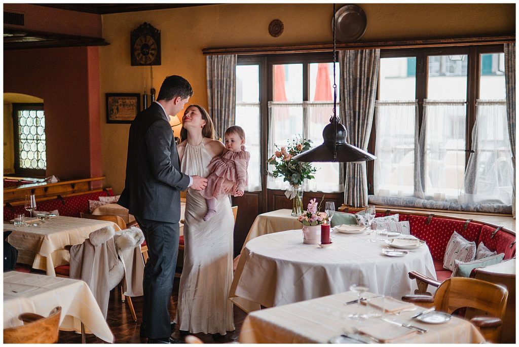 Guests mingling during intimate Swiss Alps wedding apero in Klosters
